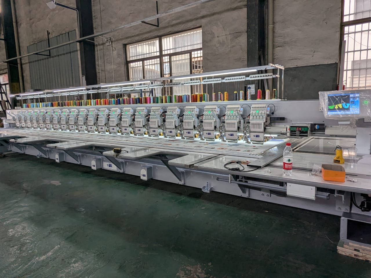 Industrial Scale Production - State-of-the-art embroidery facility with precision multi-head machines
